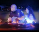 Heartstopping moment a Michigan cop saves a three-week-old baby from choking as desperate mom collapses on the ground and helpless family members look on