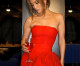 Jennifer Lopez shows off her sensational legs in strapless red dress with feather trim as she promotes her Delola cocktail line